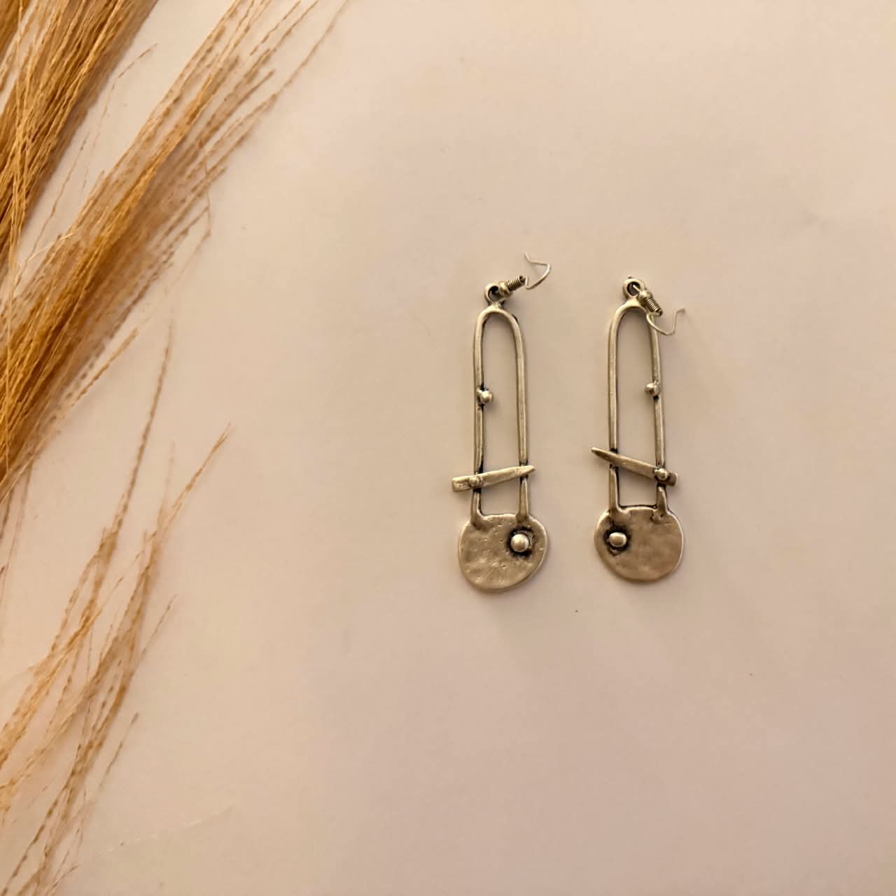 Silver-tone earrings 427