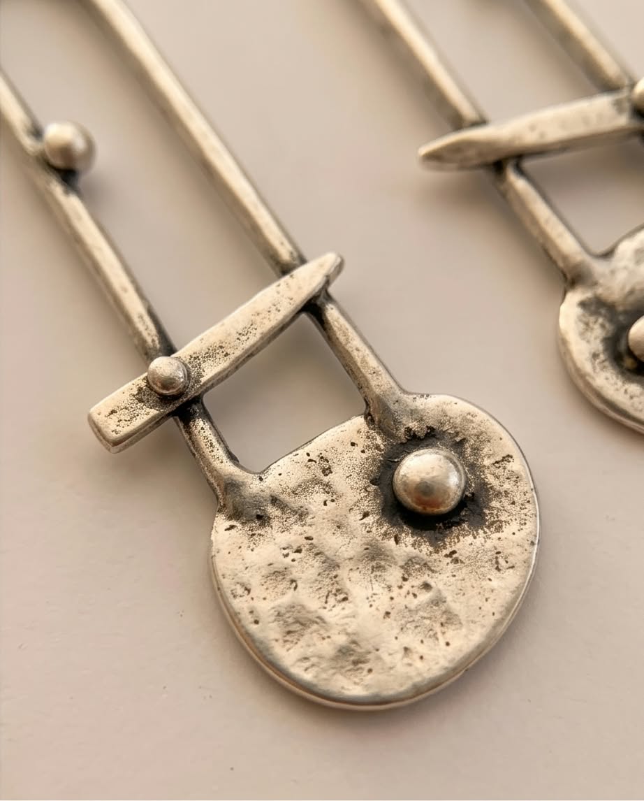 Silver-tone earrings 427